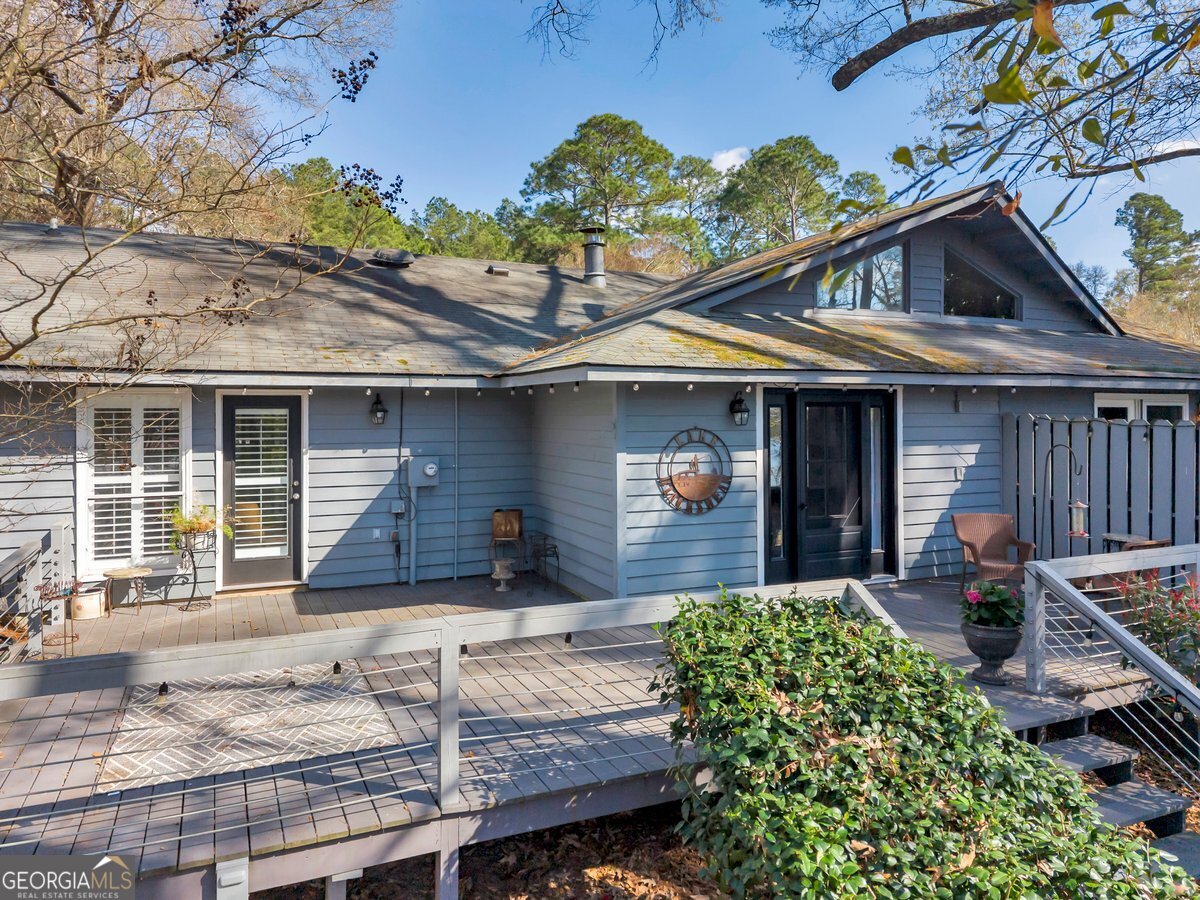 254 Valhalla Road South, Unit F Cordele, GA 31015 - Photo 31 of 41 a front view of a house with garden