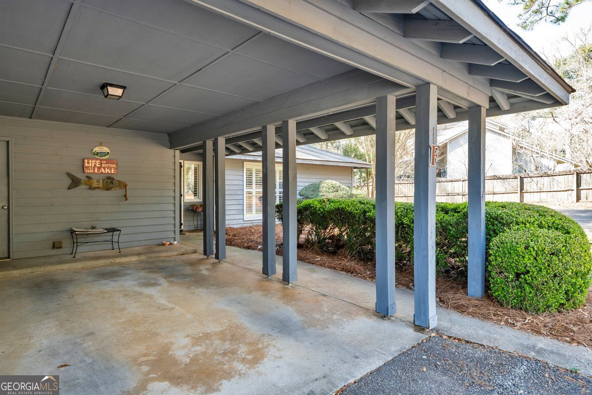 254 Valhalla Road South, Unit F Cordele, GA 31015 - Photo 32 of 41 a view of a house with porch and garden