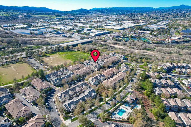 an aerial view of lake and residential houses