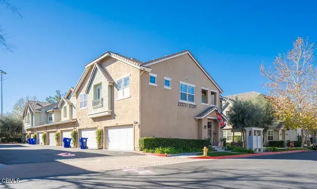 a view of a building with a street