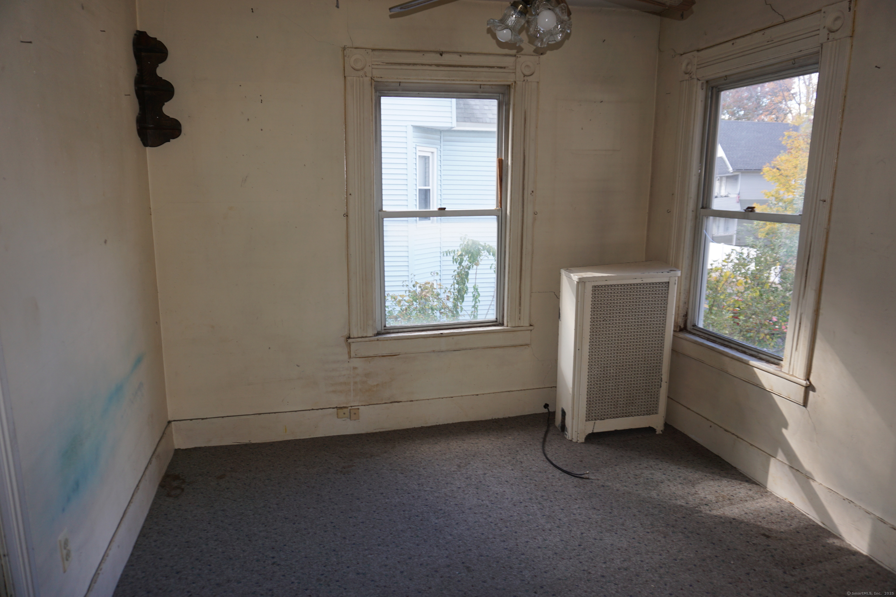 327 Orange Street Springfield, MA 01108 - Photo 17 of 32 an empty room with windows