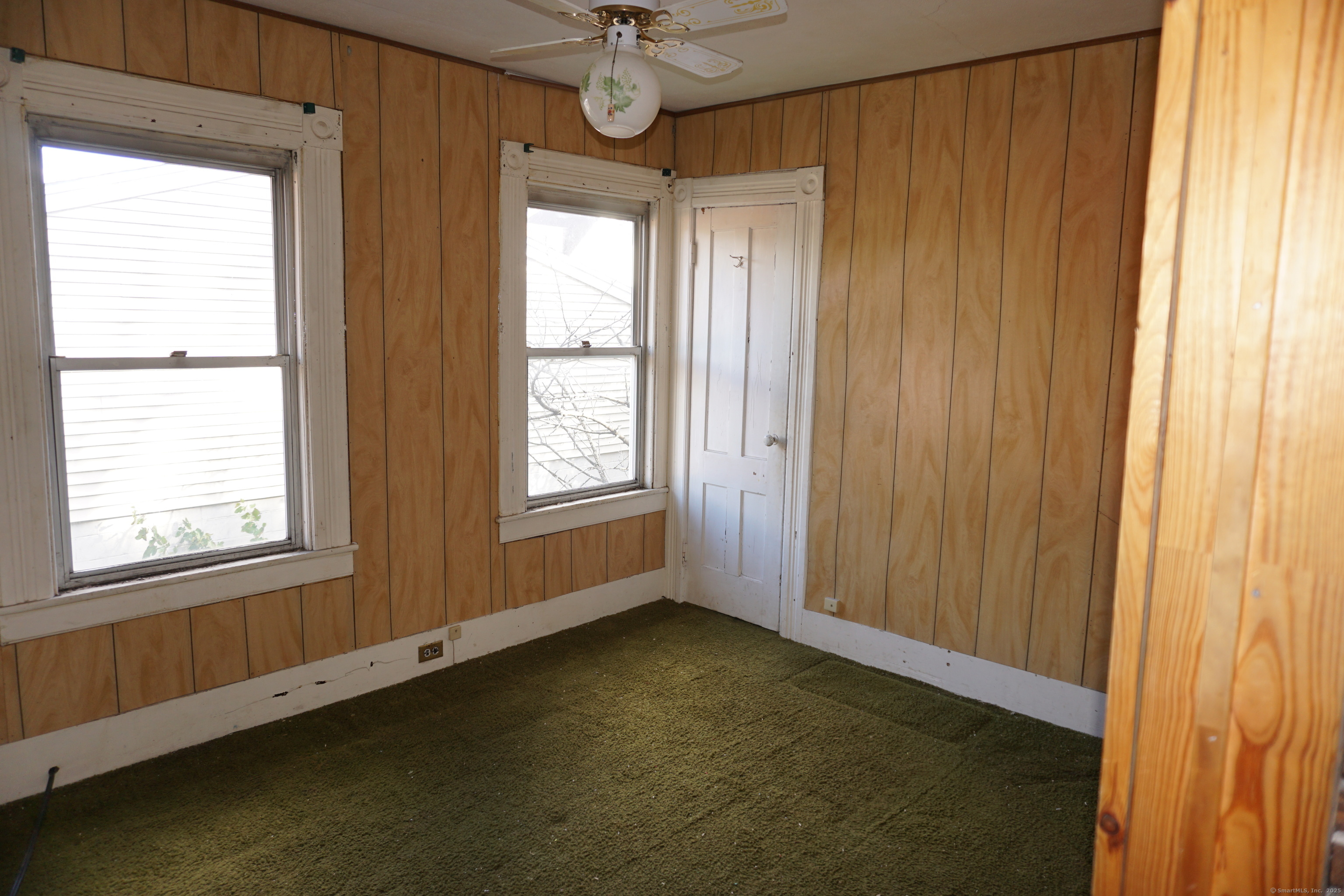 327 Orange Street Springfield, MA 01108 - Photo 30 of 32 a view of an empty room with a window