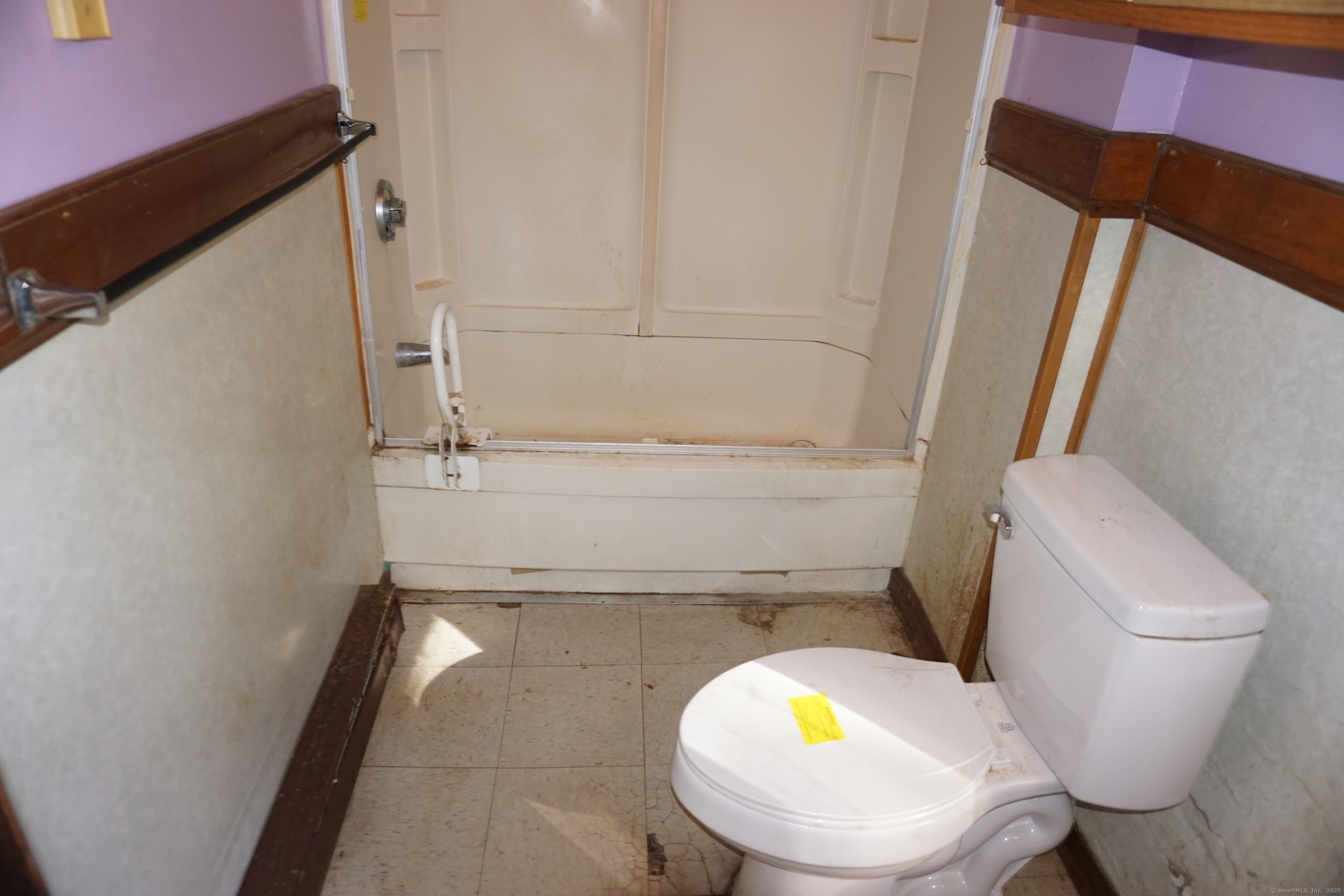 327 Orange Street Springfield, MA 01108 - Photo 5 of 32 a bathroom with a toilet and a mirror