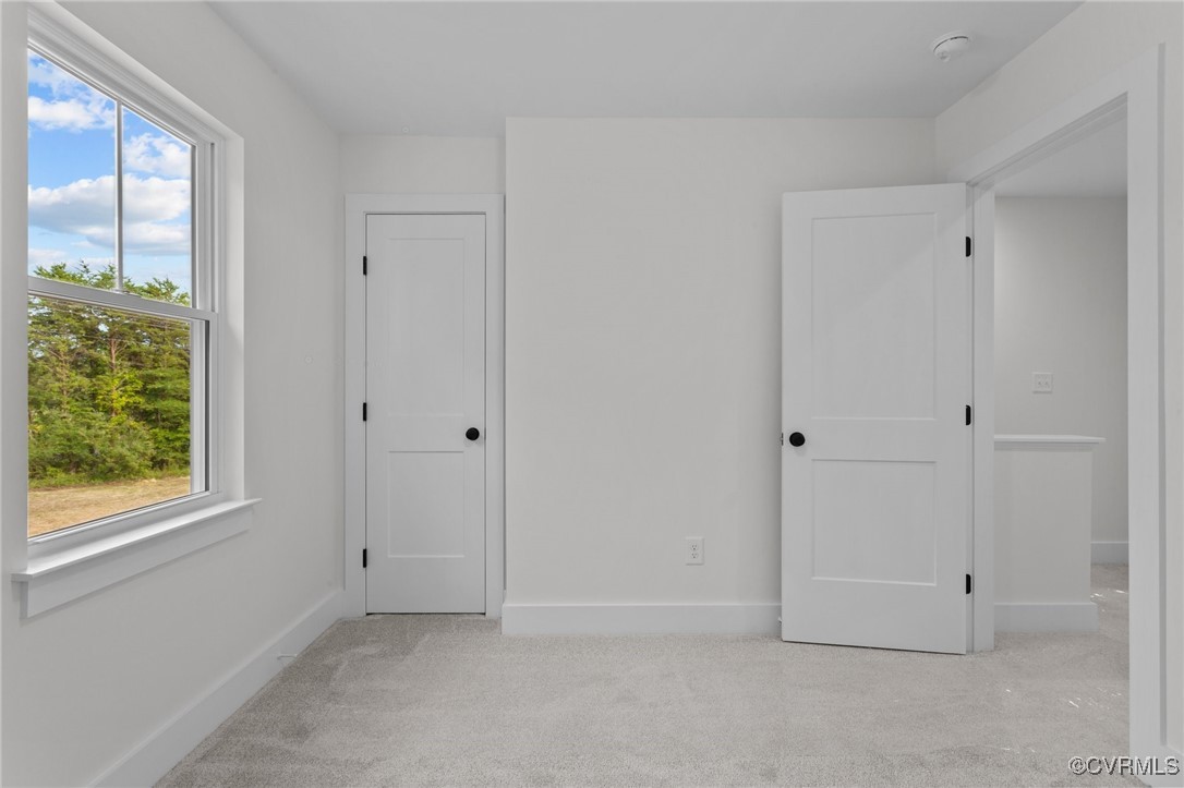 726 Stoney Point Road Cumberland, VA 23040 - Photo 21 of 32 a view of an empty room with a window