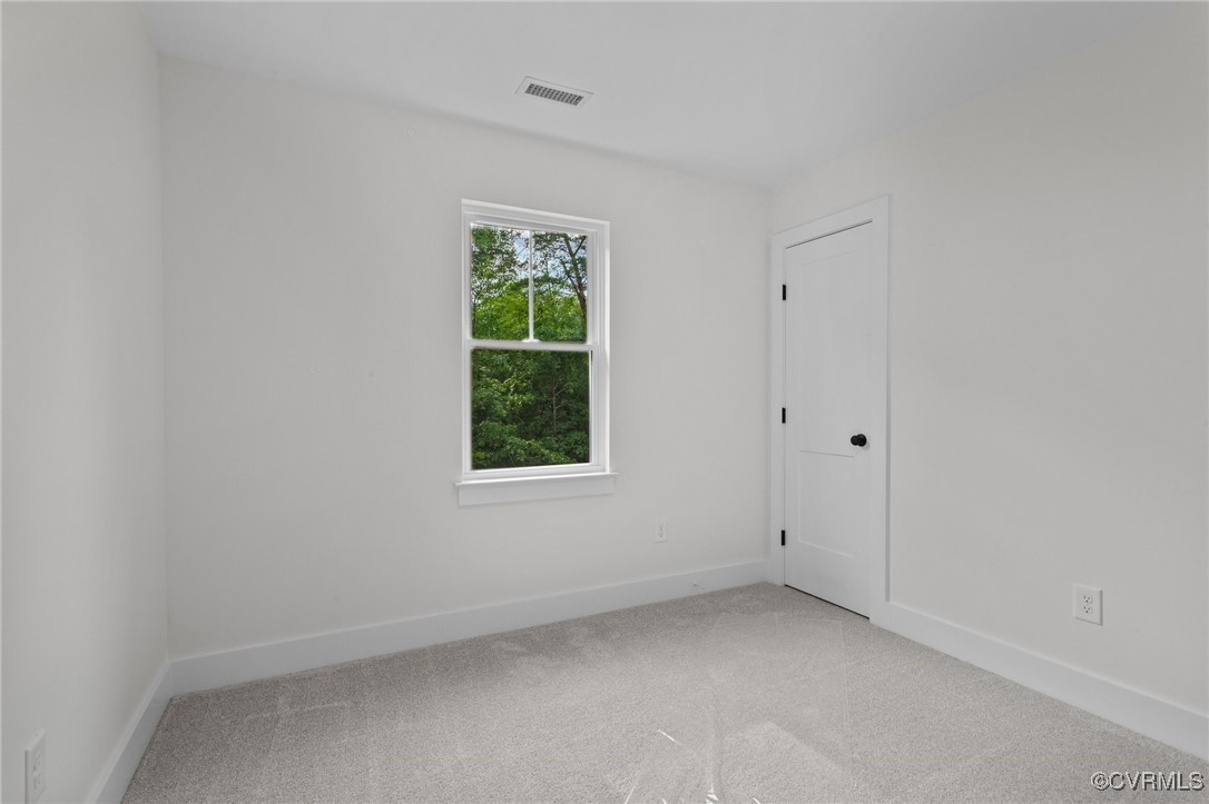 726 Stoney Point Road Cumberland, VA 23040 - Photo 22 of 32 an empty room with a window