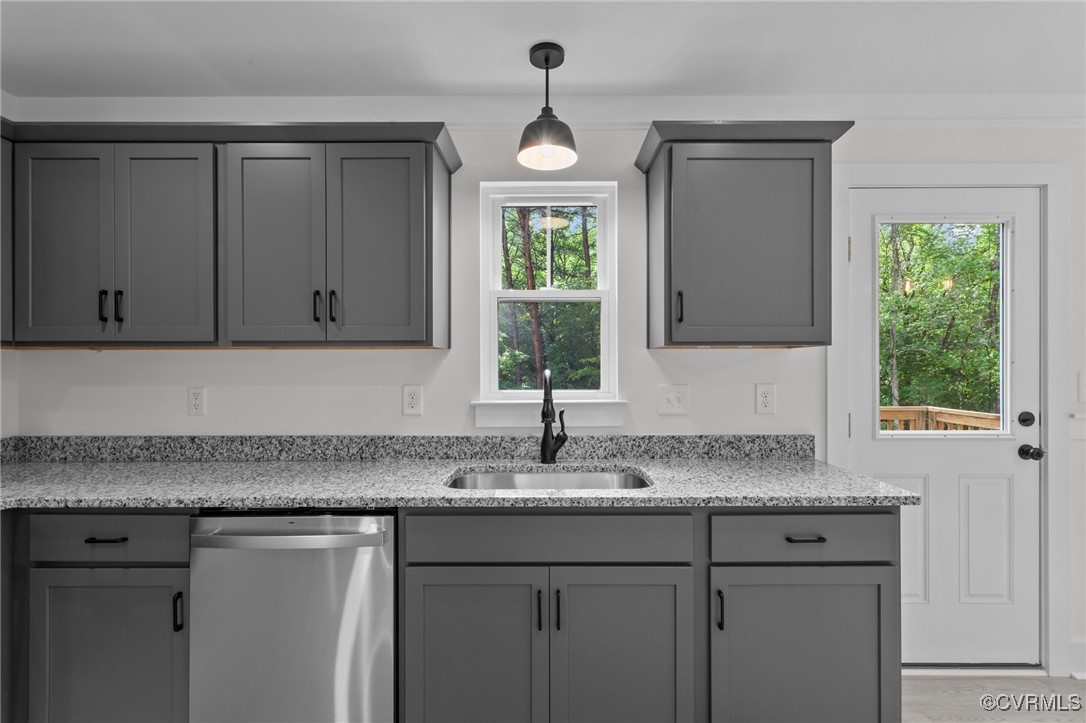 726 Stoney Point Road Cumberland, VA 23040 - Photo 8 of 32 a kitchen with granite countertop cabinets sink and window
