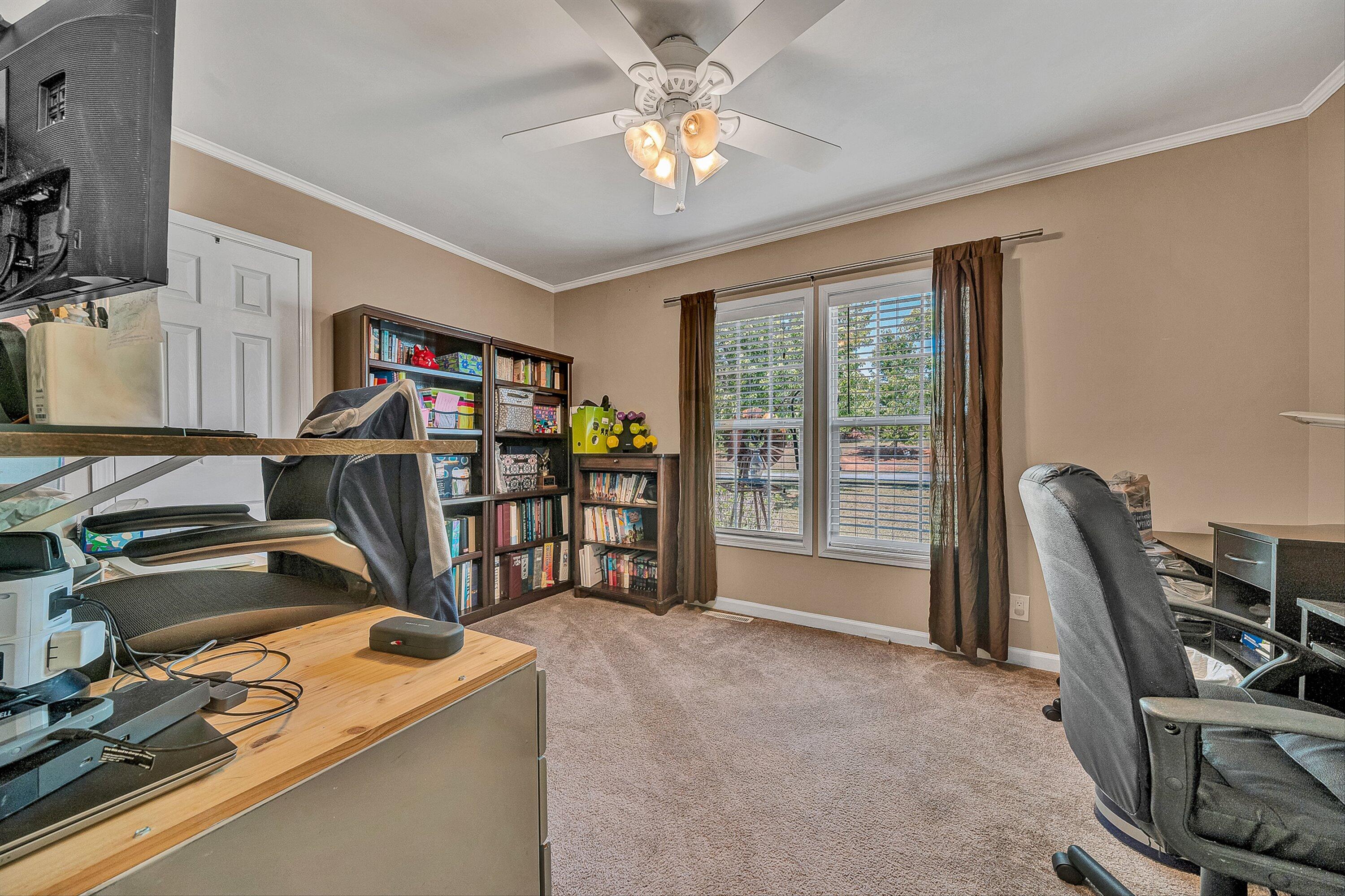 159 Simmons Creek Road Union Hall, VA 24176 - Photo 25 of 55 a view of a workspace with furniture and a window