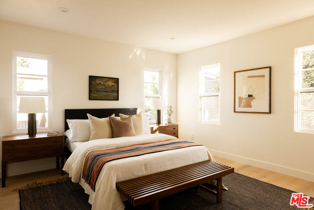 1016 Manzanita Street Los Angeles, CA 90029 - Photo 11 of 35 a bedroom with a bed and a window