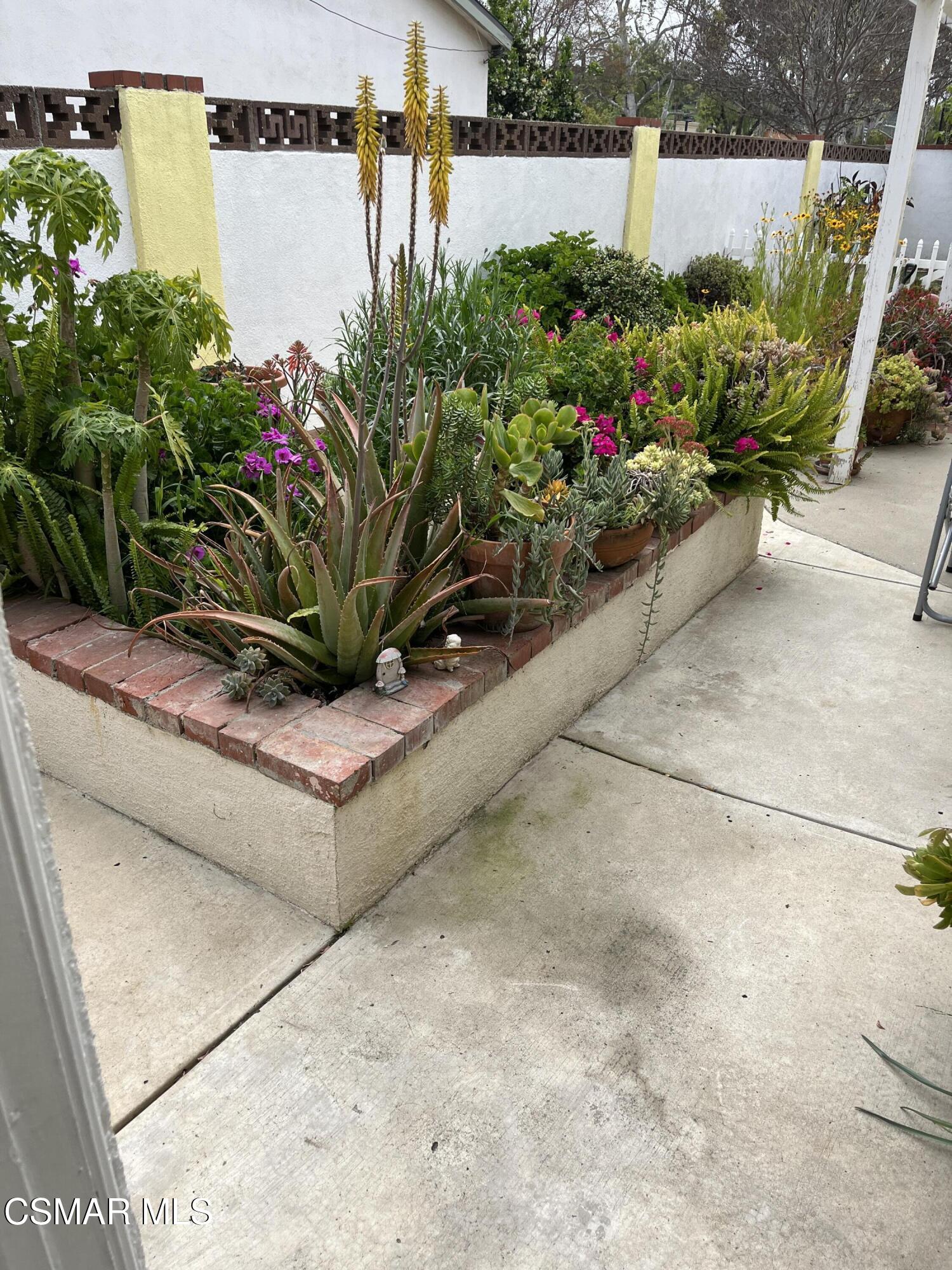 2161 Lysander Avenue Simi Valley, CA 93065 - Photo 17 of 44 a view of a garden with flowers