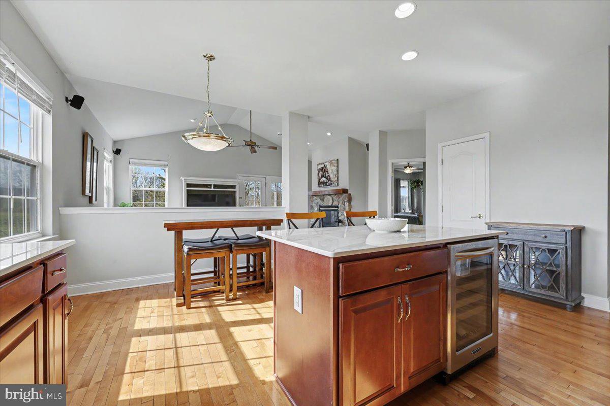 32 Par Circle Pottstown, PA 19464 - Photo 12 of 34 a kitchen with a stove a sink a dining table and chairs