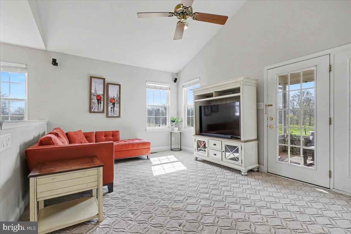 32 Par Circle Pottstown, PA 19464 - Photo 13 of 34 a living room with furniture and a flat screen tv