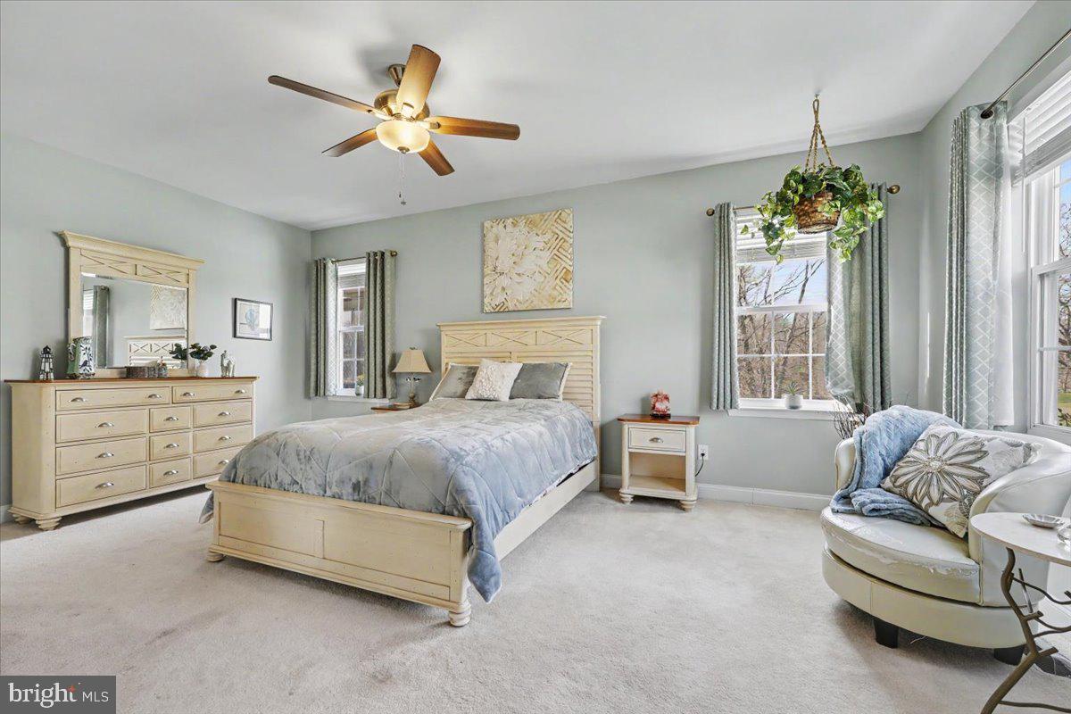32 Par Circle Pottstown, PA 19464 - Photo 16 of 34 a spacious bedroom with a bed furniture and window