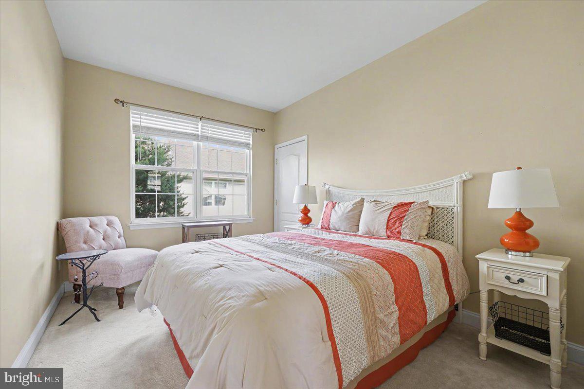 32 Par Circle Pottstown, PA 19464 - Photo 20 of 34 a bedroom with a bed a rug and a window