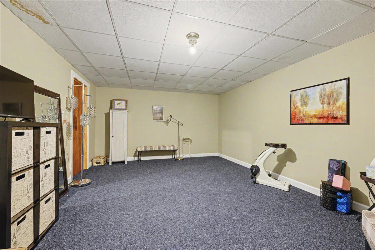 32 Par Circle Pottstown, PA 19464 - Photo 25 of 34 a view of a livingroom with gym equipment