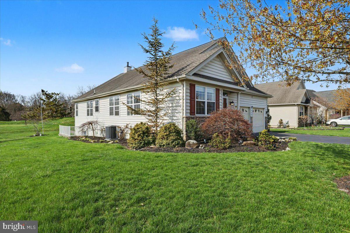 32 Par Circle Pottstown, PA 19464 - Photo 3 of 34 a front view of a house with a garden