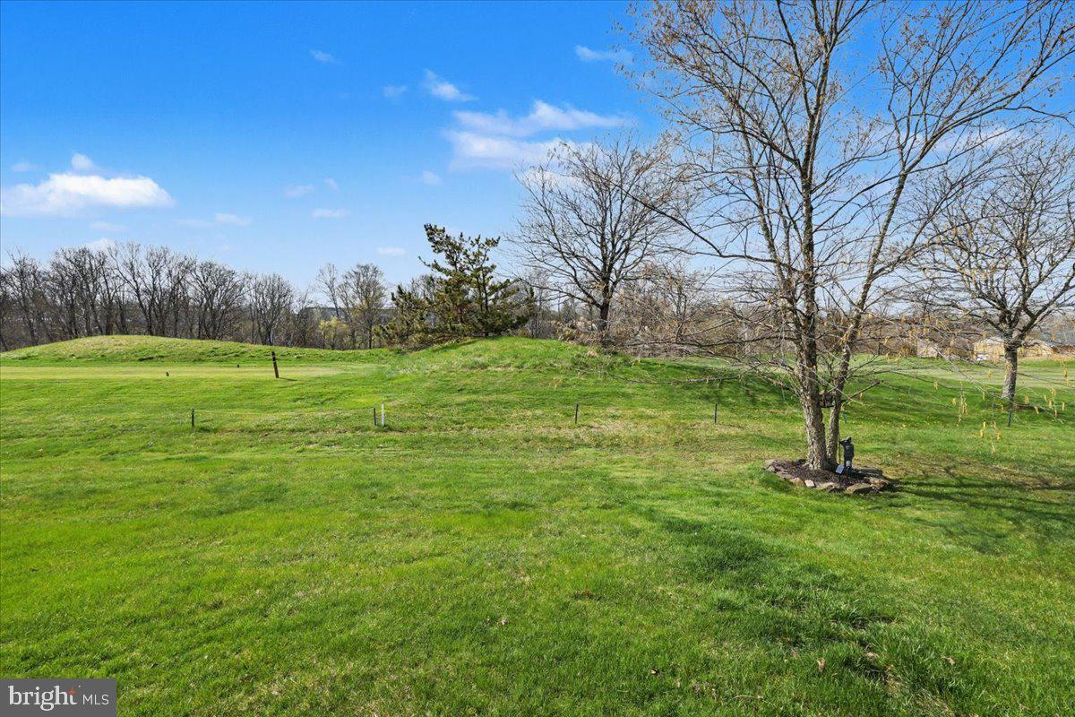 32 Par Circle Pottstown, PA 19464 - Photo 32 of 34 a view of a grassy field with trees