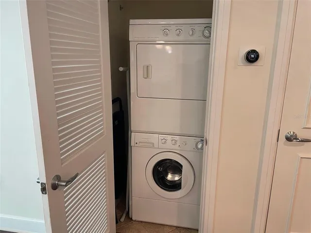 a view of a balcony with wooden floor