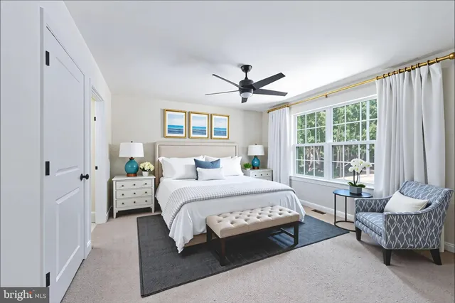 a bathroom with a sink and a window