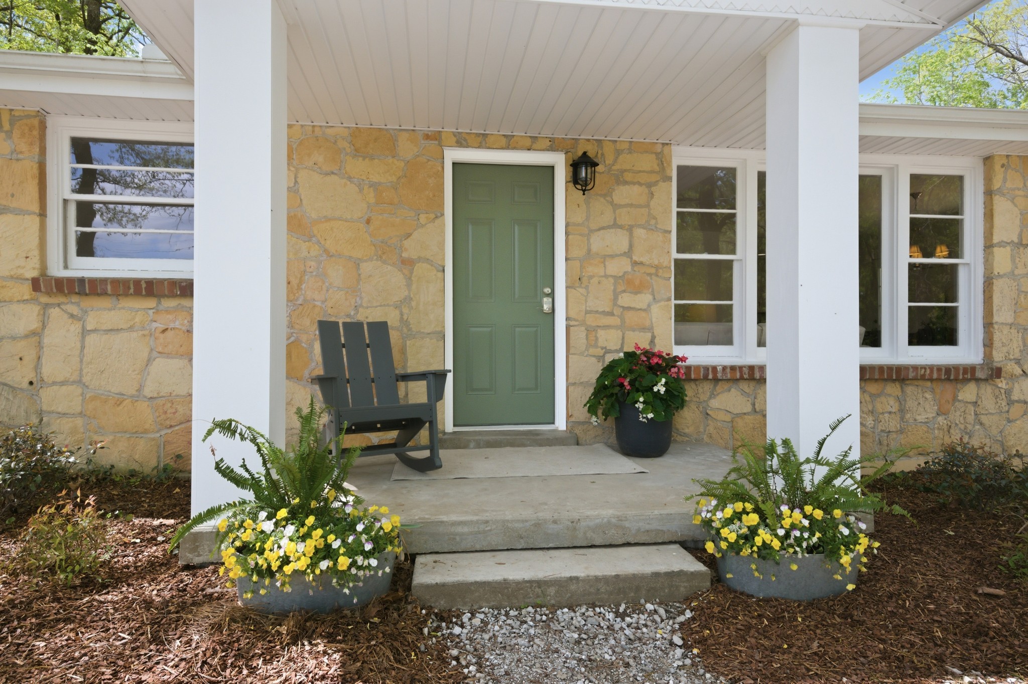 1566 Porter Road Burns, TN 37029 - Photo 1 of 41 a flower vase with flowers and potted plant