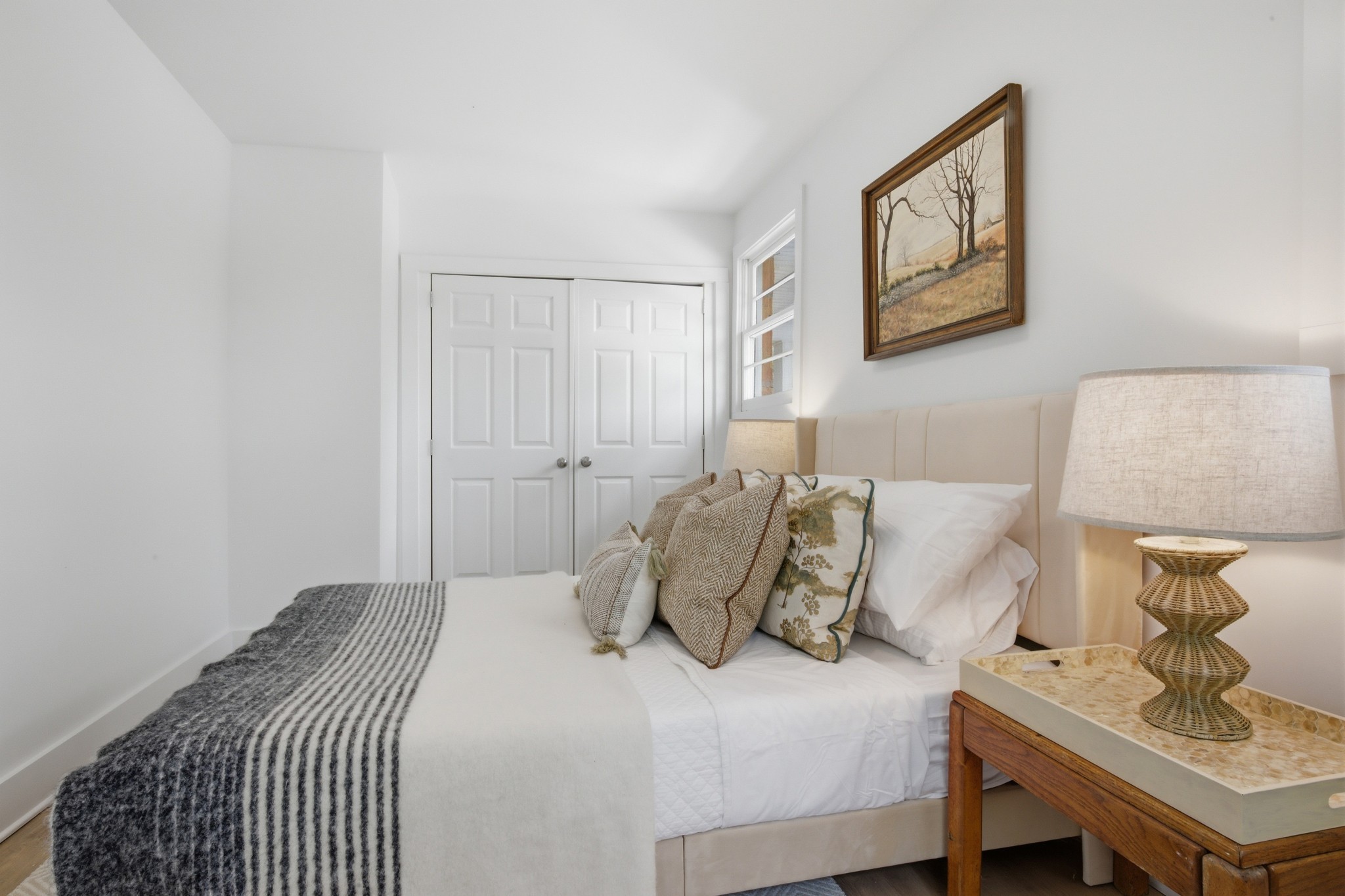 1566 Porter Road Burns, TN 37029 - Photo 20 of 41 a bedroom with a bed and painting on the wall