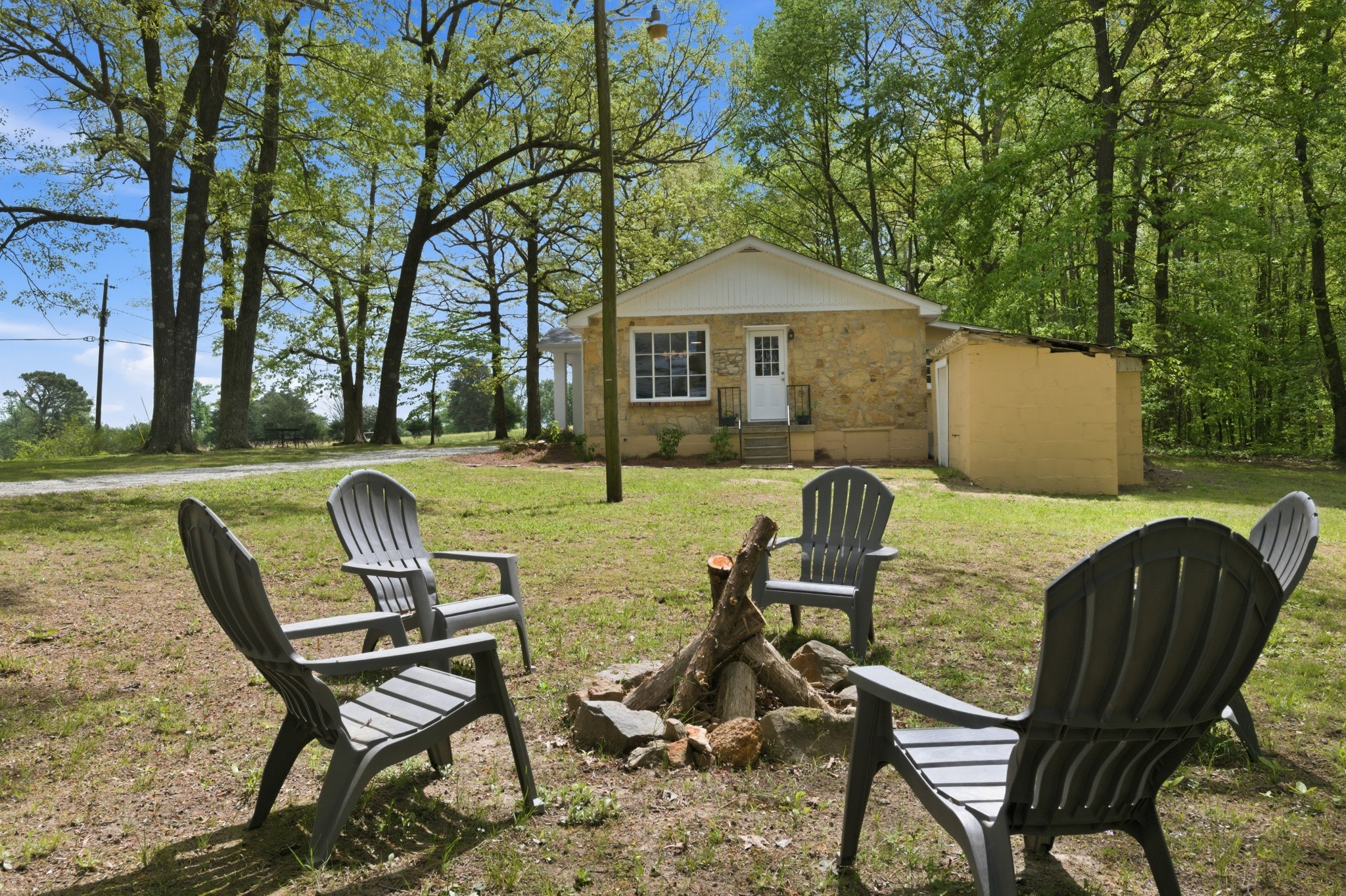 1566 Porter Road Burns, TN 37029 - Photo 26 of 41 a view of a house with backyard and sitting area