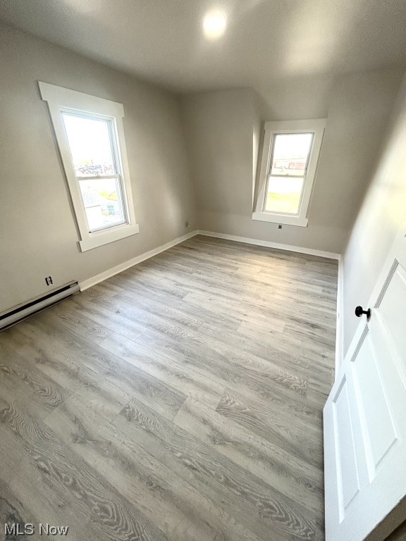 57 South Seneca Street Rittman, OH 44270 - Photo 19 of 26 Spare room featuring light hardwood / wood-style flooring