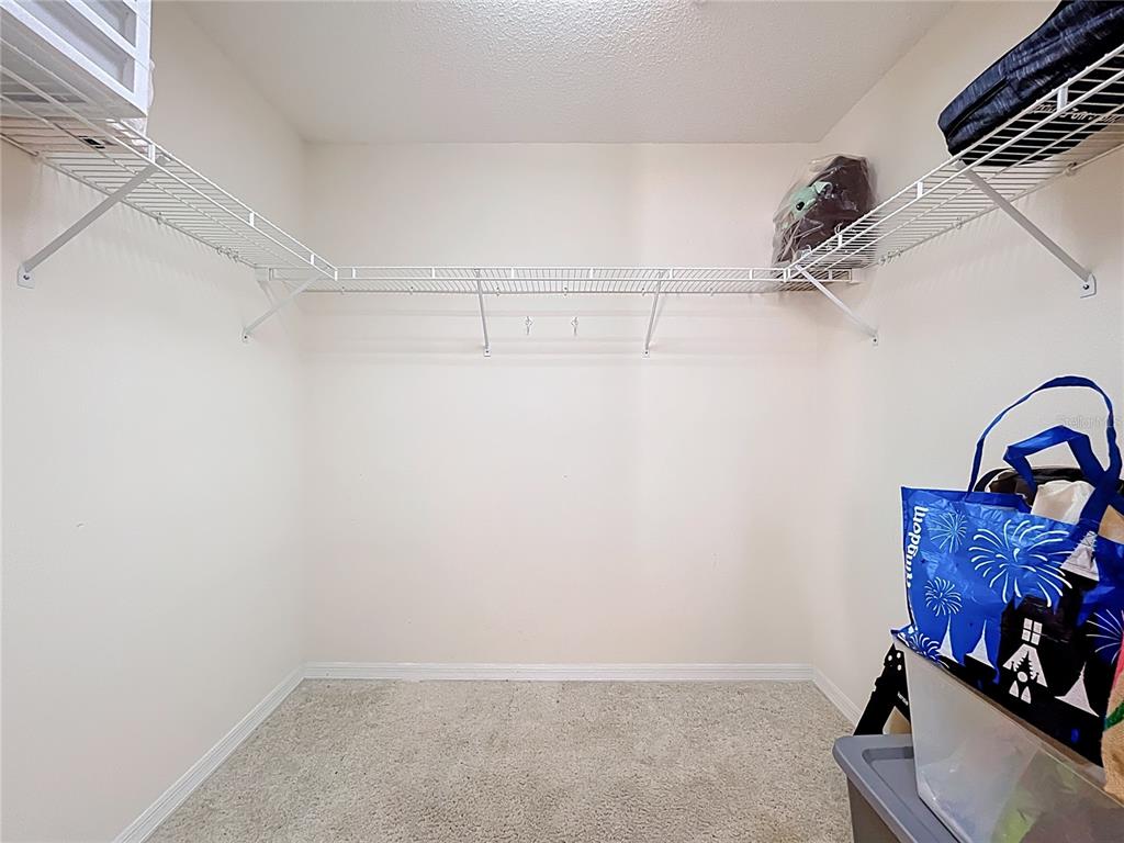 1050 Loch Vail, Unit 21 Apopka, FL 32712 - Photo 36 of 46 a view of a room with rack on the wall