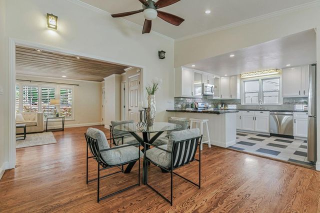 an empty room with wooden floor