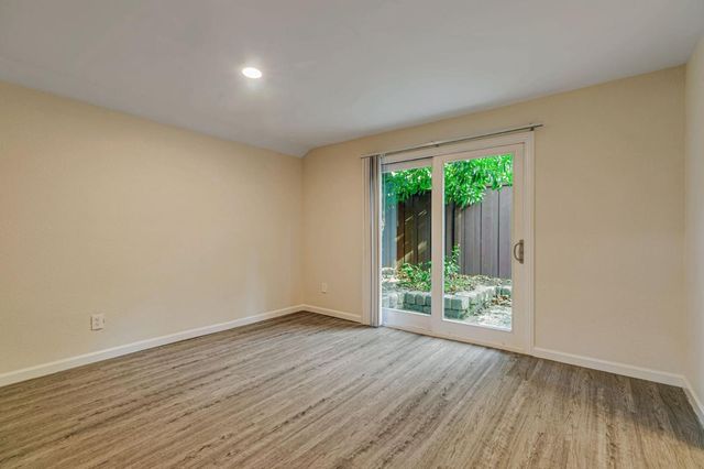 a view of a room with rack on the wall