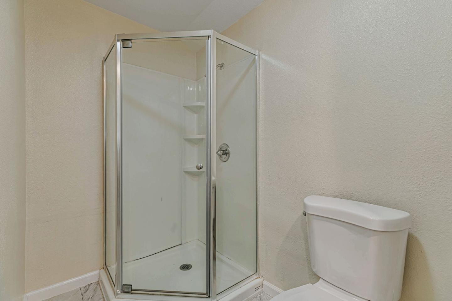 668 Curtner Avenue Campbell, CA 95008 - Photo 34 of 49 a bathroom with a shower and a toilet