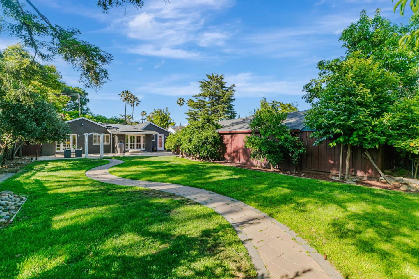 668 Curtner Avenue Campbell, CA 95008 - Photo 44 of 49 a view of a house with a big yard potted plants and large tree