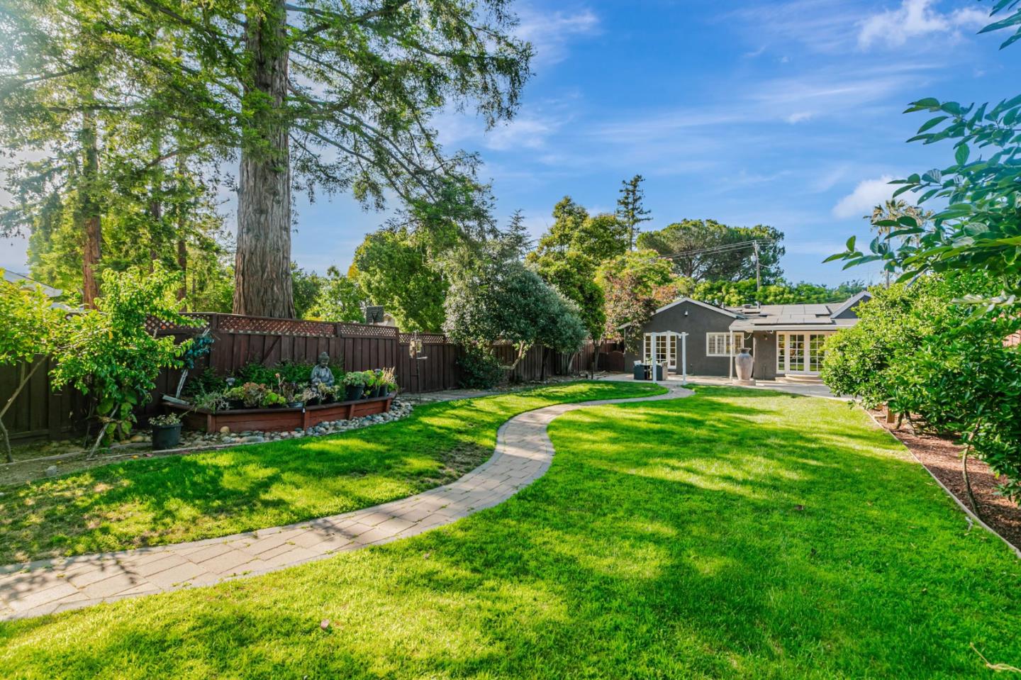 668 Curtner Avenue Campbell, CA 95008 - Photo 45 of 49 a front view of a house with a yard