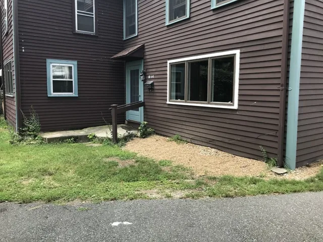a house view with a backyard space