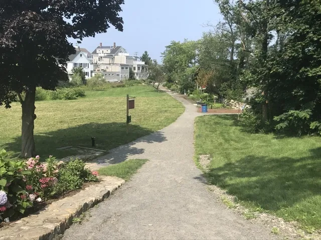 a view of lake with a yard