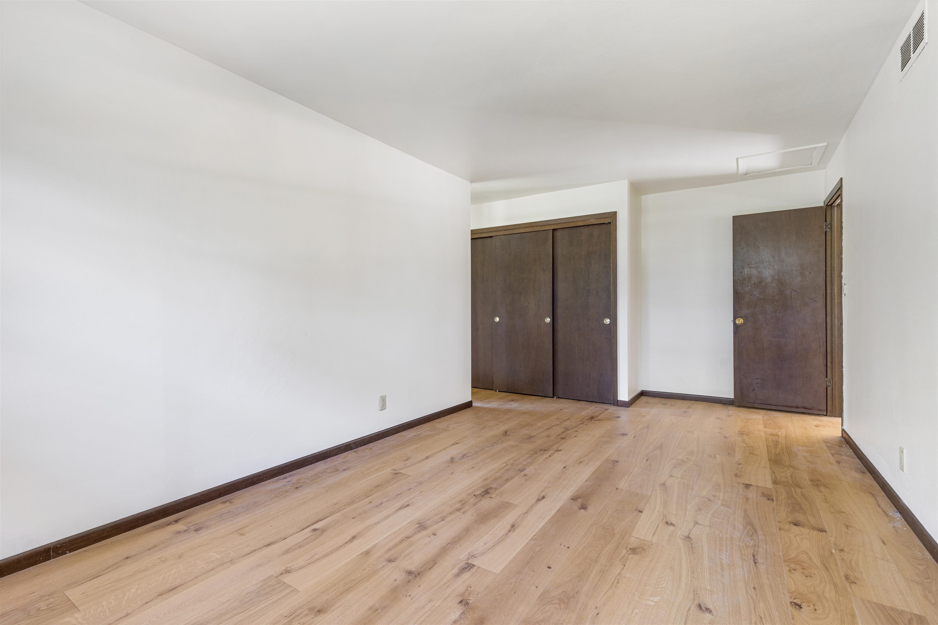 7660 Stephens Road Rockton, IL 61072 - Photo 13 of 34 a view of an empty room and wooden floor