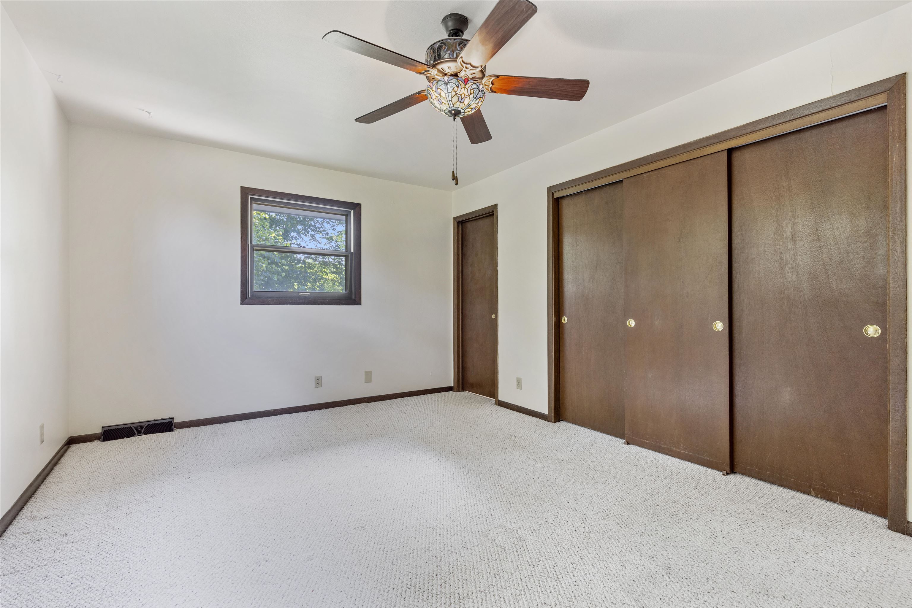 7660 Stephens Road Rockton, IL 61072 - Photo 24 of 34 a view of a room with a ceiling fan and a shower