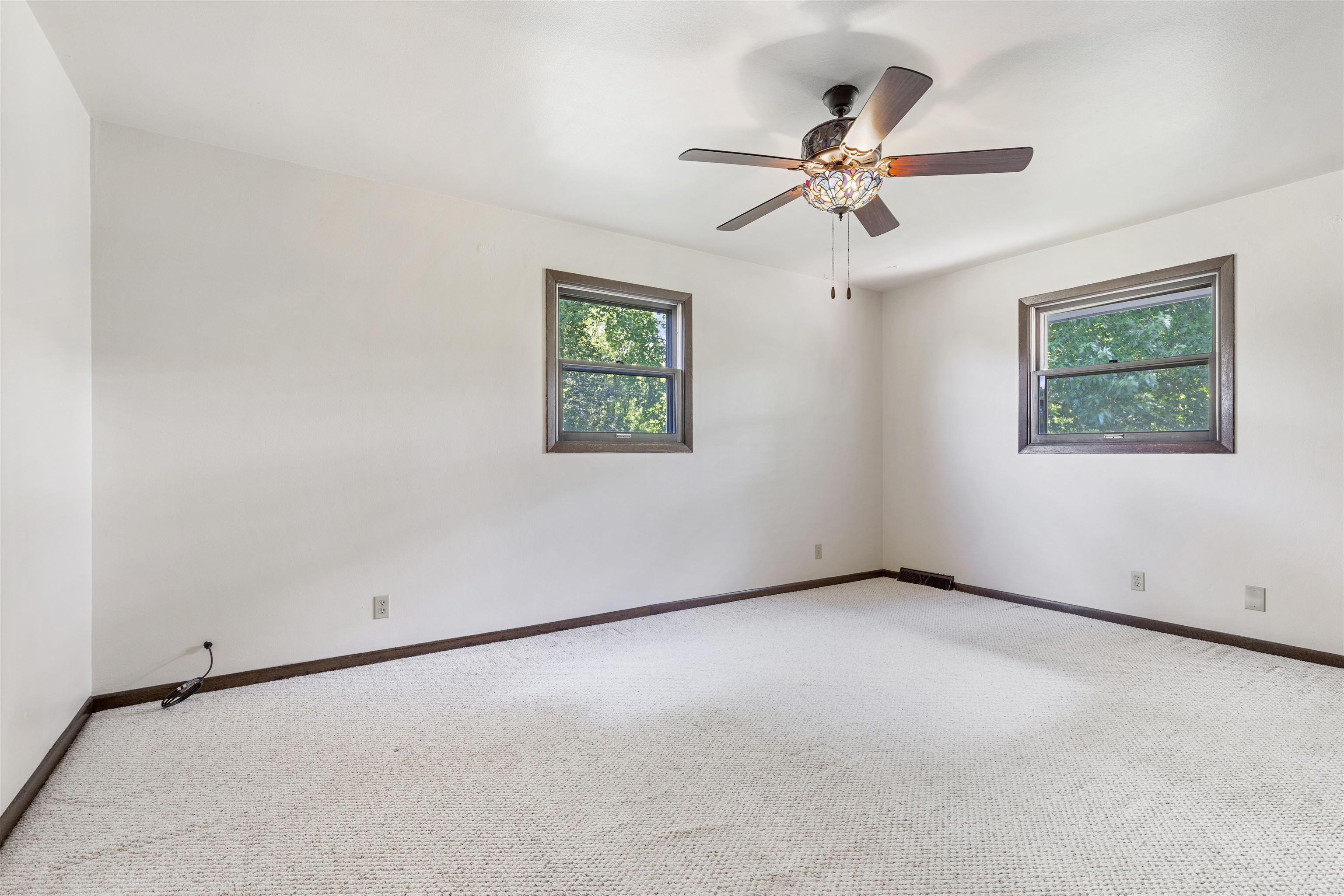 7660 Stephens Road Rockton, IL 61072 - Photo 25 of 34 an empty room with a window and a fan