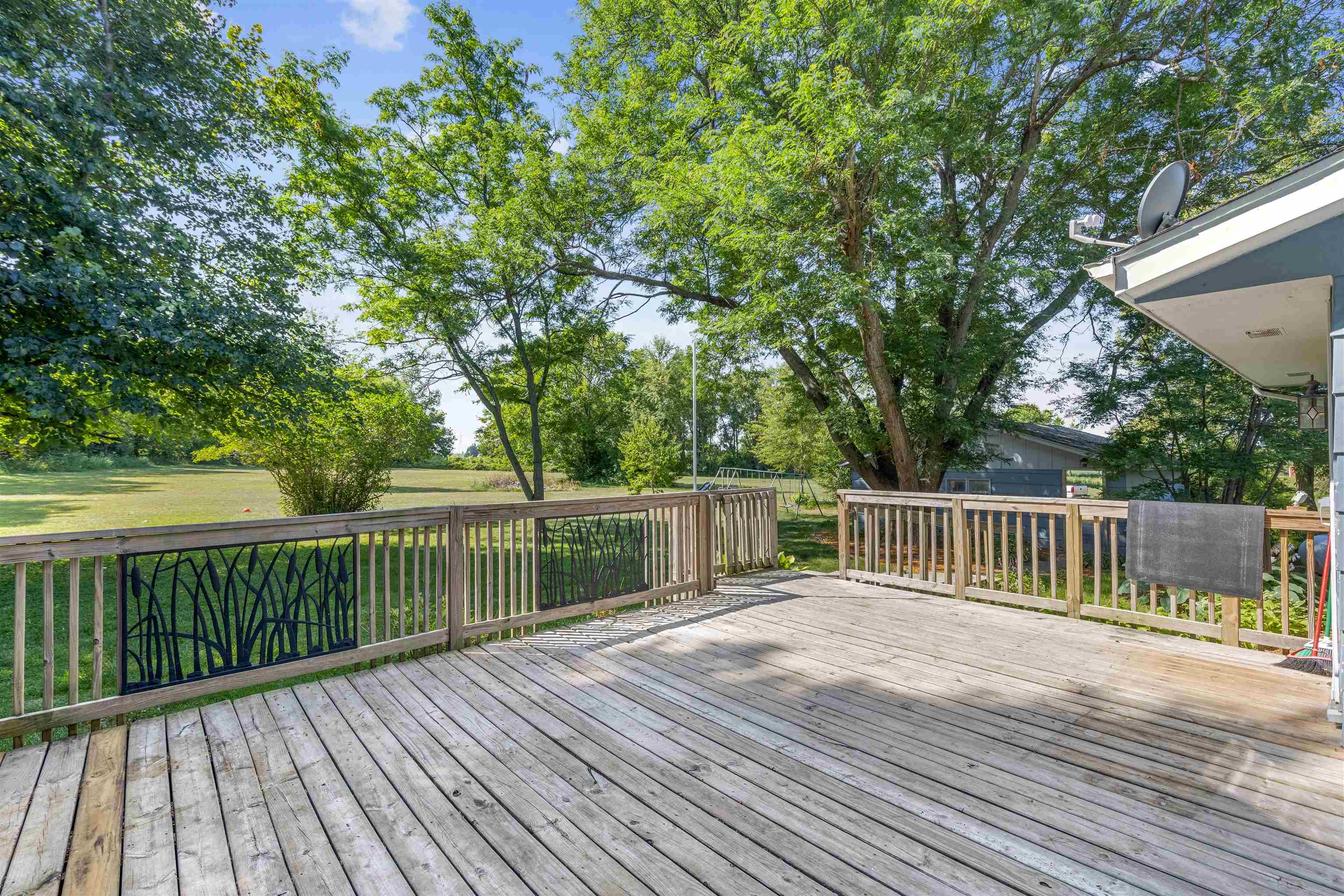 7660 Stephens Road Rockton, IL 61072 - Photo 27 of 34 a balcony with wooden floor and fence