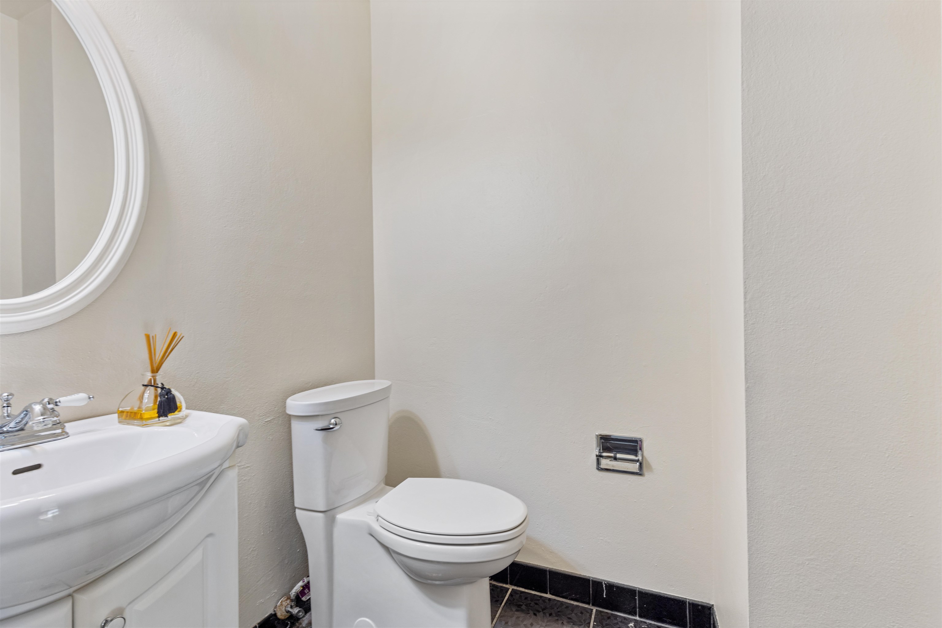 7660 Stephens Road Rockton, IL 61072 - Photo 9 of 34 a white toilet sitting next to a bathroom sink