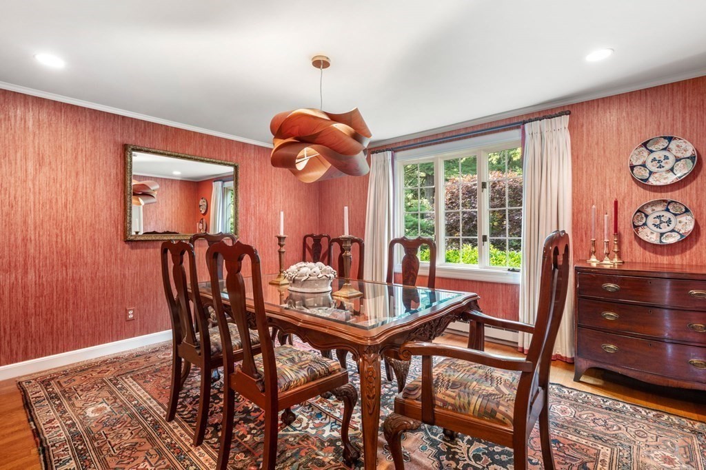 17 Fields Pond Road Weston, MA 02493 - Photo 17 of 41 a view of a dining room with furniture window and wooden floor