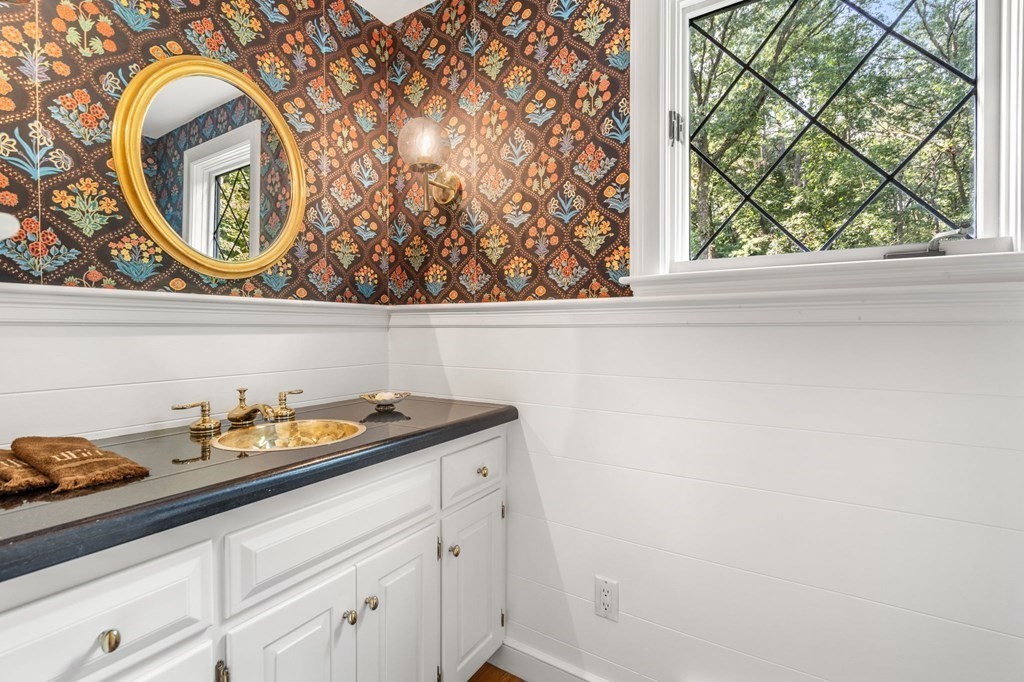 17 Fields Pond Road Weston, MA 02493 - Photo 19 of 41 a bathroom with a granite countertop sink and a window
