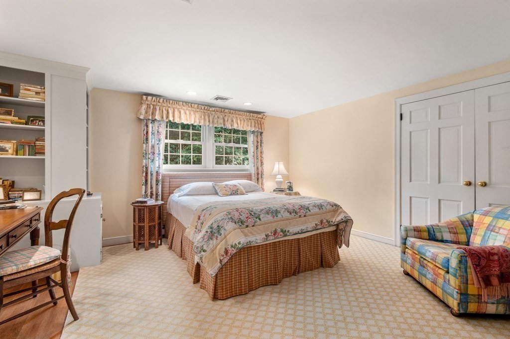 17 Fields Pond Road Weston, MA 02493 - Photo 24 of 41 a bedroom with a bed chair and window