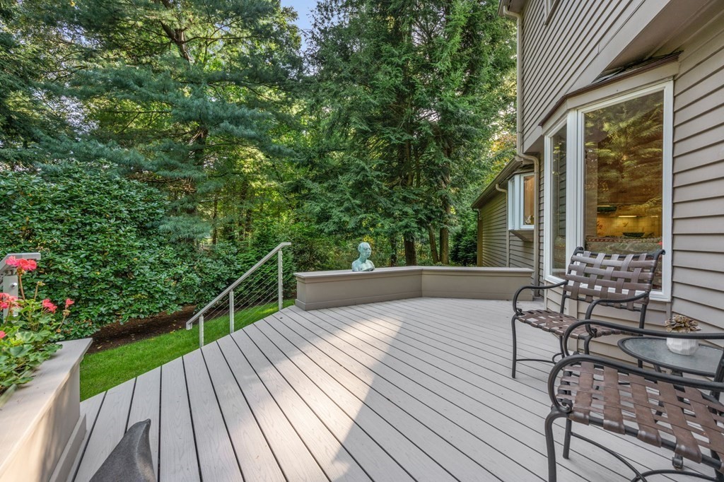 17 Fields Pond Road Weston, MA 02493 - Photo 29 of 41 a view of balcony with wooden floor and seating space