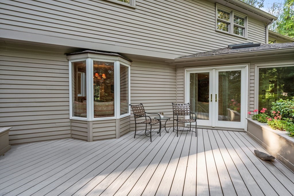 17 Fields Pond Road Weston, MA 02493 - Photo 30 of 41 a view of a house with a patio