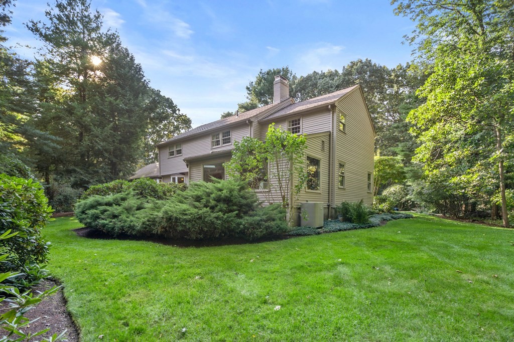17 Fields Pond Road Weston, MA 02493 - Photo 36 of 41 a view of a back yard of the house