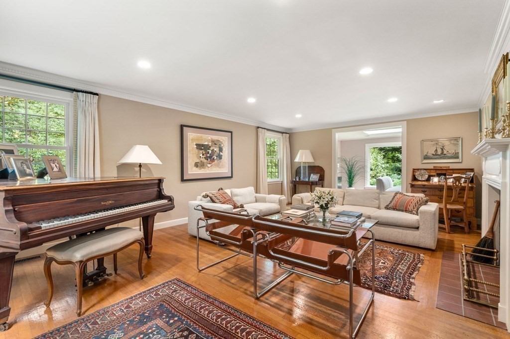 17 Fields Pond Road Weston, MA 02493 - Photo 5 of 41 a living room with furniture a rug and a large window