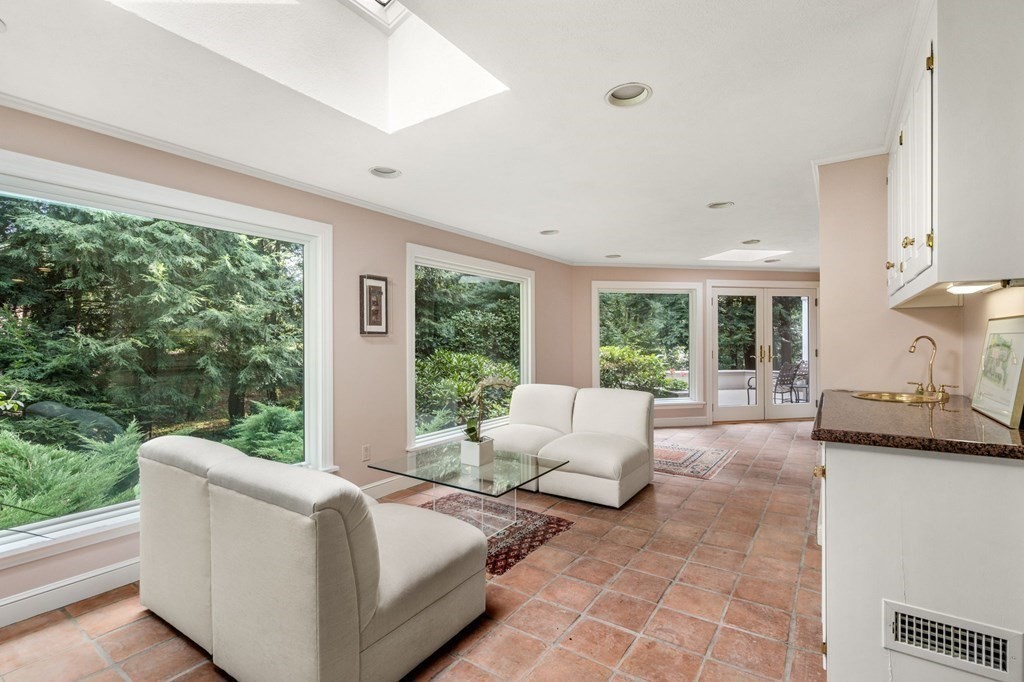 17 Fields Pond Road Weston, MA 02493 - Photo 8 of 41 a living room with furniture and a large window