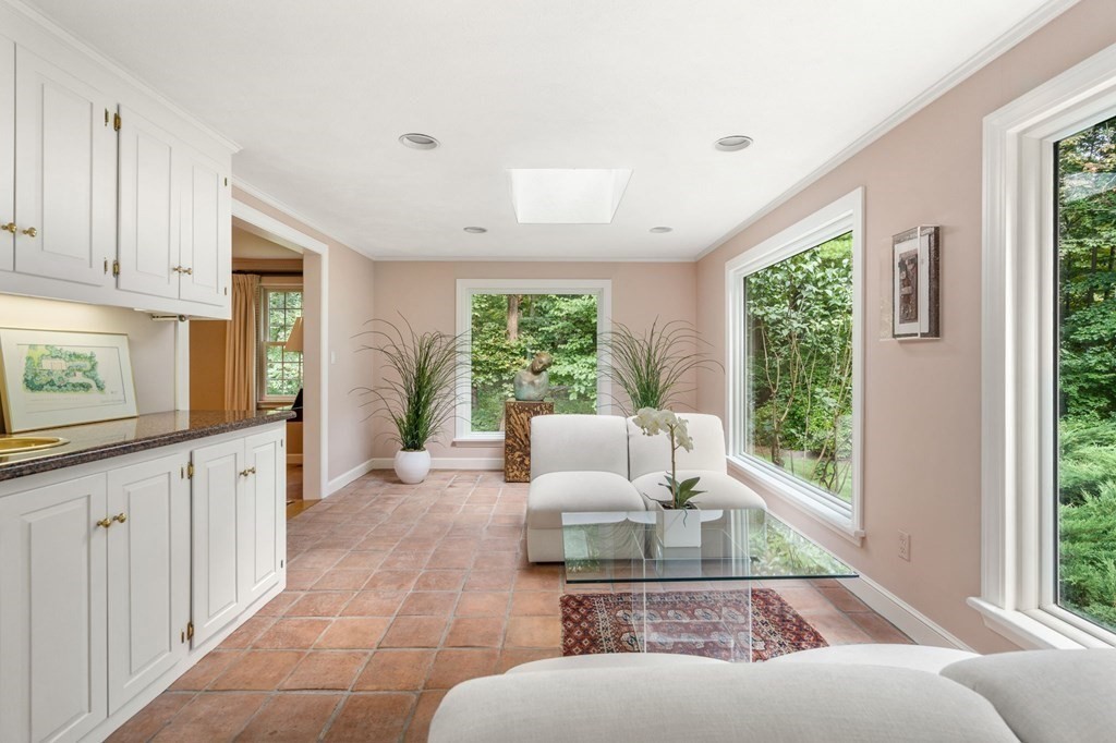 17 Fields Pond Road Weston, MA 02493 - Photo 9 of 41 a living room with furniture and a large window