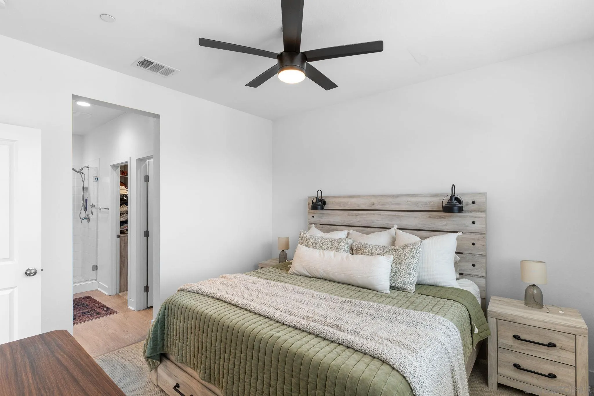 8702 Barbados Lane Santee, CA 92071 - Photo 21 of 39 a bedroom with a bed and a dresser