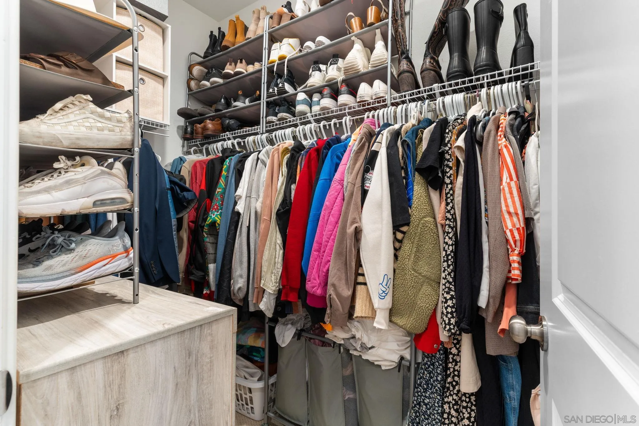 8702 Barbados Lane Santee, CA 92071 - Photo 24 of 39 a view of walk in closet with clothes